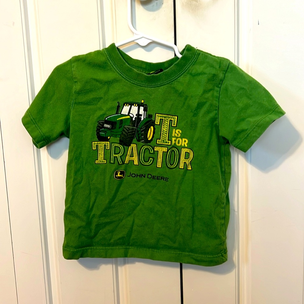 John Deere tractor shirt. No size, best guess would be 2T.
